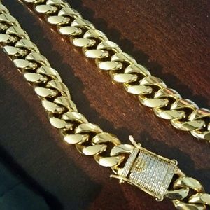 Cuban Link, costume jewelry. ..gold plated